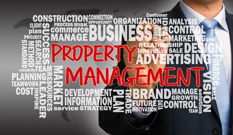 property management concept with related word cloud handwritten by businessman